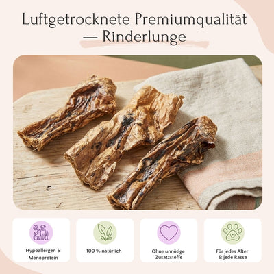 Drei Stück Rinderlunge (900 g) von FAVLY Petfood auf Stoff, mit deutschem Text und vier Symbolen für Kauspielzeug.