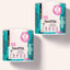 Zwei Eimer FAVLY Petfood FloraVITAL Pulver - Sonderangebot, mit blaugrünem und rosa Etikett auf hellem Grund.