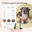 Ein glücklicher Hund mit HEPASKIN Pulver von FAVLY Petfood für Haut, Fell & Entgiftung sitzt an seinem Futternapf.