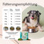 Ein Hund sitzt beim Futter; FAVLY Petfood Relax Pulver - Sonderangebot und Futtertabelle für Stressabbau Hund sind abgebildet.