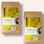Zwei braune Säcke FAVLY Petfood Weidelamm mit Rote Beete, Karotte & Hanföl mit gelben Etiketten und Hundenäpfen.